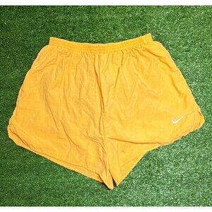 Nike women’s  Orange Mesh Polyester Running Shorts M Elastic Waist Logo